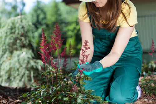 Landscaping team managing a scheduled project variation and rescheduling
